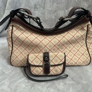 Dooney & Burke Signature Shoulder Handbag 
And matching wristlet